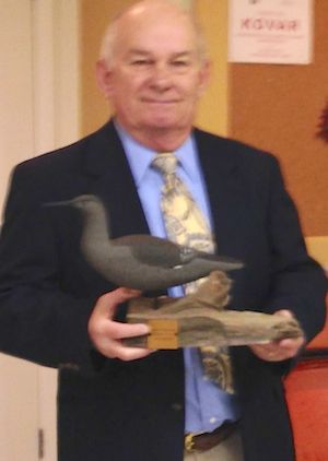 Former Police Chief received a duck carving fro the Town. (Wave photo)