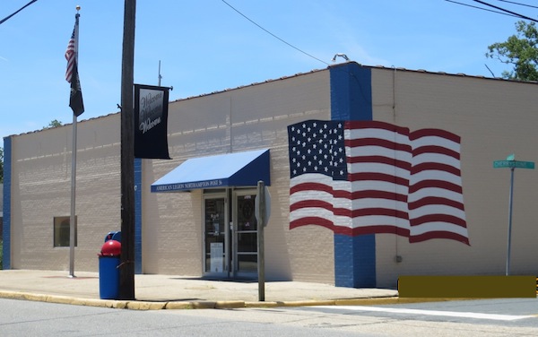 Flag appears to float on American Legion building -- a "trump d'oilel," or trick to the eye. (Photo: Wendy Martin)